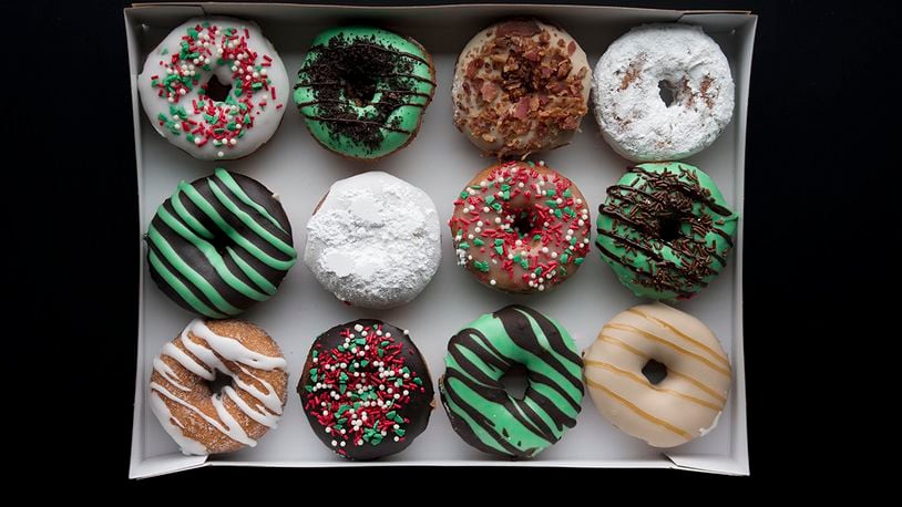 Duck Donuts is offering holiday season-themed doughnuts through Dec. 31. CONTRIBUTED