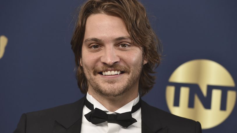 Luke Grimes arrives at the 28th annual Screen Actors Guild Awards at the Barker Hangar on Sunday, Feb. 27, 2022, in Santa Monica, Calif. (Photo by Jordan Strauss/Invision/AP)