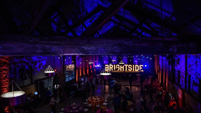 The Brightside Music and Event Venue held its grand opening on Friday, Oct. 12. After more than a year of elbow grease, owners Carli and Hamilton Dixon are “ecstatic.” The couple purchased the vacant building 10 years ago because they felt Dayton was losing industry and people. TOM GILLIAM / CONTRIBUTING PHOTOGRAPHER