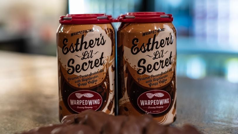 The secret is out! Warped Wing Brewing Company hosted their 9th annual Esther's Li'l Secret Launch Party & Reveal at the brewery's downtown Dayton taproom on Thursday, Nov. 3, 2022. Esther's Li'l Secret is the annual holiday collaboration between Warped Wing and Esther Price Fine Chocolates. This year’s beer is a Caramel Pecan Scotch Ale with Boston Stoker’s Highlander Grogg Coffee. A barrel aged version is also available. Did we spot you there? TOM GILLIAM/CONTRIBUTING PHOTOGRAPHER