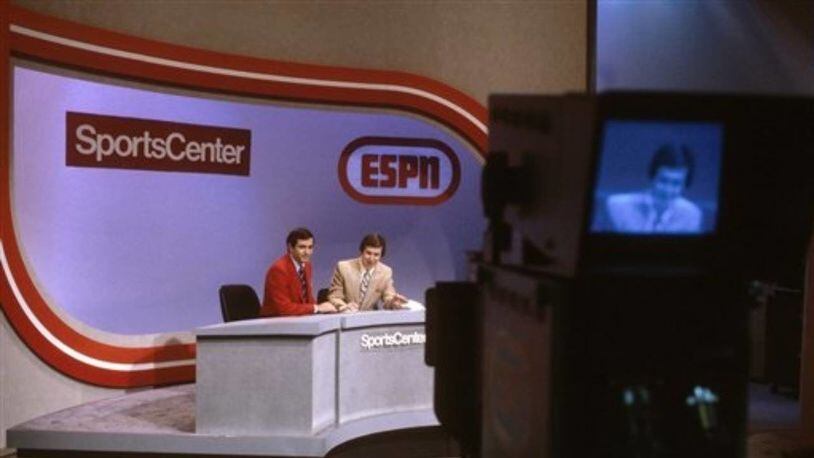 Bob Ley, right, and George Grande were anchors when ESPN debuted in 1979. Ley announced he is retiring after 40 years with the sports cable network.