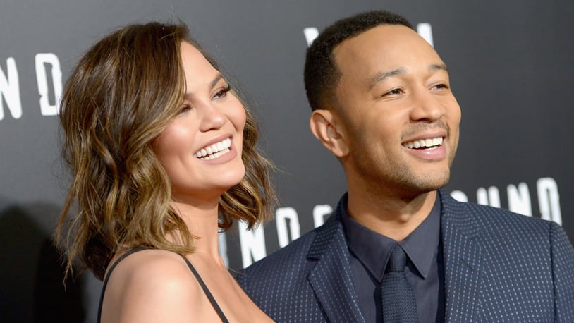 WESTWOOD, CA - FEBRUARY 28:  Model Chrissy Teigen (L) and actor/singer/executive producer John Legend attend WGN America's "Underground" Season Two Premiere Screening at Regency Village Theatre on March 1, 2017 in Westwood, California.