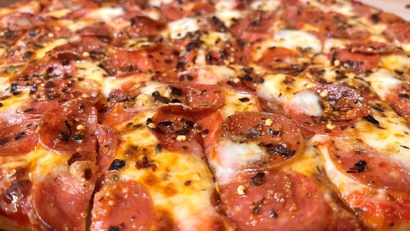 Hot Honey Pepperoni Pizza from Donatos. The pizza features pepperoni, fresh mozzarella, crushed pepper and Mike’s Hot Honey.