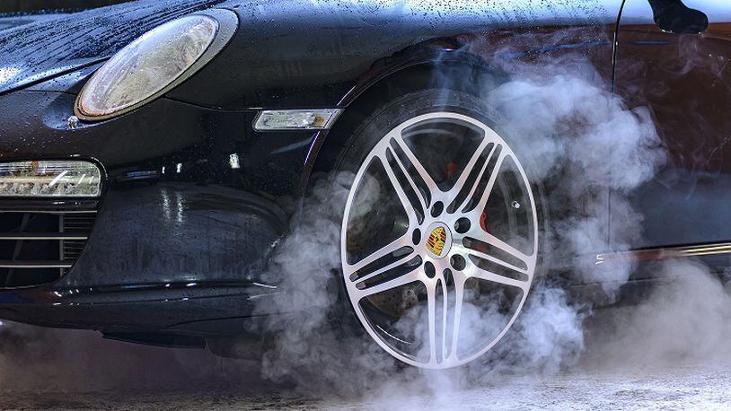 A Porsche rolls through a car wash. CONTRIBUTED