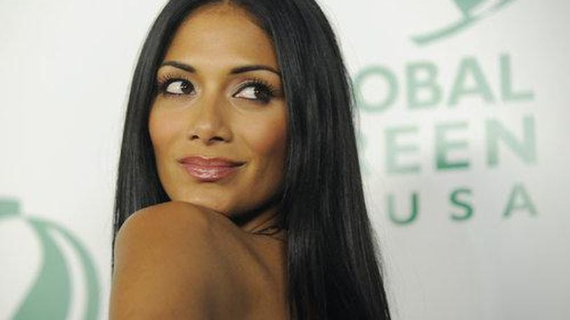Nicole Scherzinger of the Pussycat Dolls poses at Global Green USA's 7th Annual Pre-Oscar Party in Los Angeles, Wednesday, March 3, 2010.