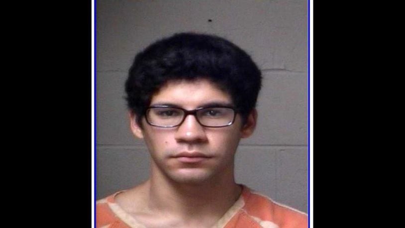 Joshua Chestney, 18, has turned himself in on charges that he accidentally shot his best friend in the face in a local park.
