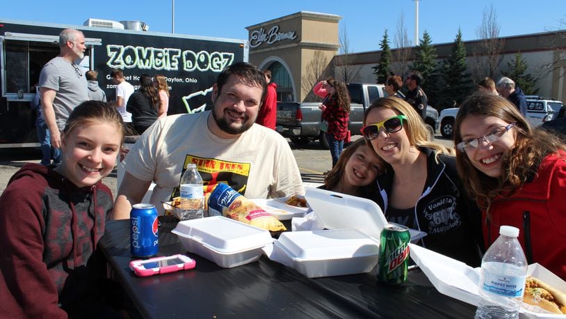 Hundreds of hungry folks turned out Saturday afternoon, March 26, for the Kettering Food Truck rally in the parking lot of the Sears Outlet/Elder Beerman shopping center on East Dorothy Lane in Kettering. Photos by Mark Fisher/Staff