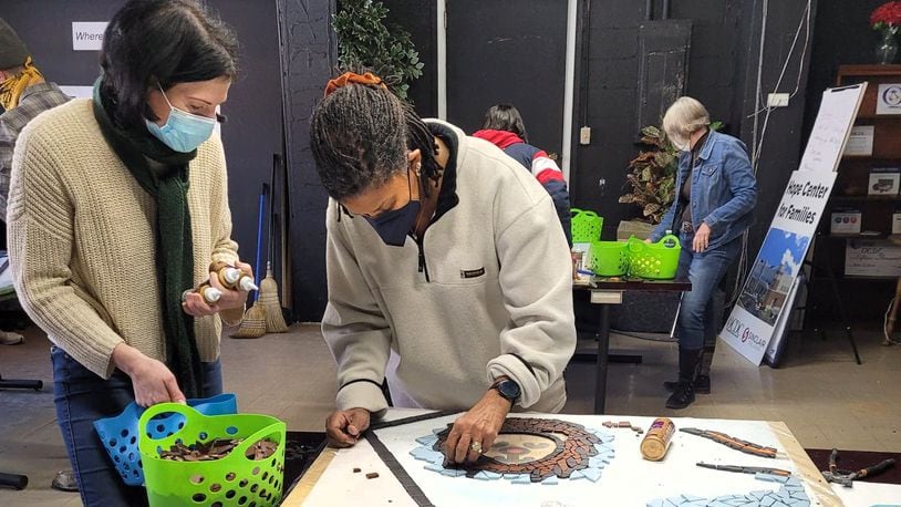 Volunteers have begun assembling “Together We Rise,” a 400-square-foot play station, will be installed at the Hope Center for Families, 1800 Harvard Blvd. in Dayton later this summer.  MOSAIC INSTITUTE OF DAYTON