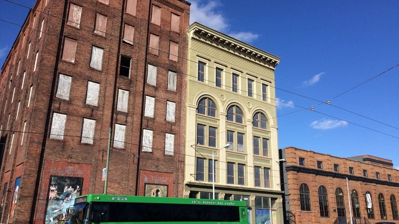 Woodard Development plans to buy the building at the corner, 601 E. Third St. Woodard already owns the building next door (607 E. Third St.) and helped transform the Steam Plant Dayton building at 617 E. Third St. CORNELIUS FROLIK / STAFF