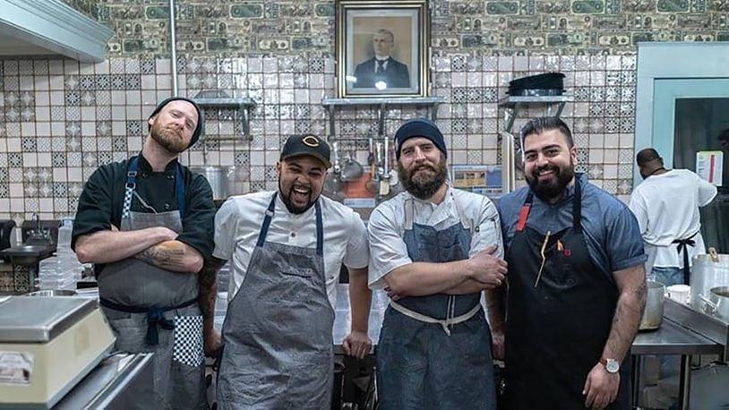 Two of the cofounders of Jollity, Brendon Miller (far left) and Zackary Weiner (second from left) enjoy creating new menus for a different take on “meat and potatoes.” They are shown with friends Jonathon Mezera and Andy Bagherian, who have helped them cook during their pop-ups. CONTRIBUTED