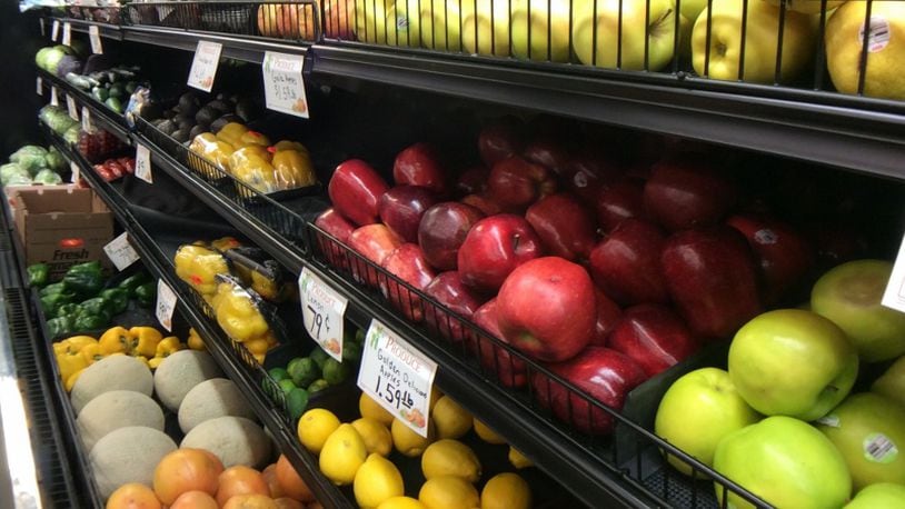 A recent renovation allowed Stop-n-Save in downtown Dayton to expand its produce selection. MARK FISHER/STAFF
