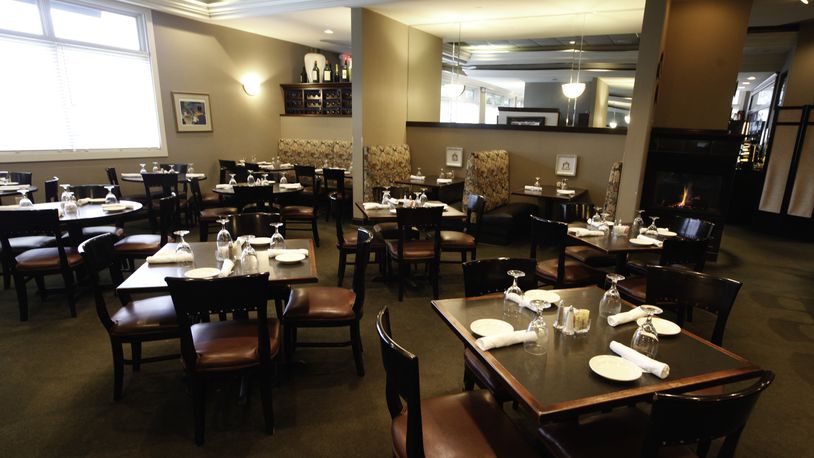 Dining room of the Wellington Grille in Beavercreek. 2013 file photo by CHRIS STEWART / STAFF