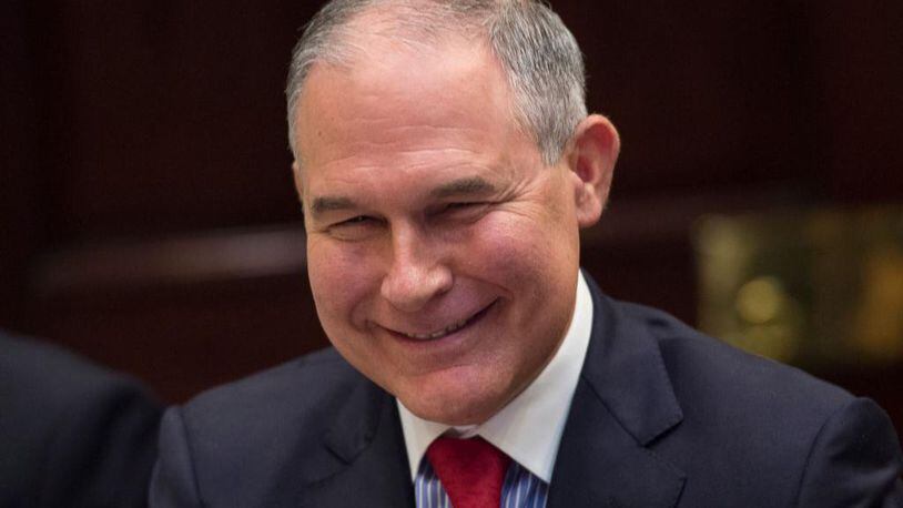Environmental Protection Agency Administrator Scott Pruitt smiles while President Donald Trump leads an energy roundtable in the Roosevelt Room at the White House on June 28, 2017 in Washington, DC.