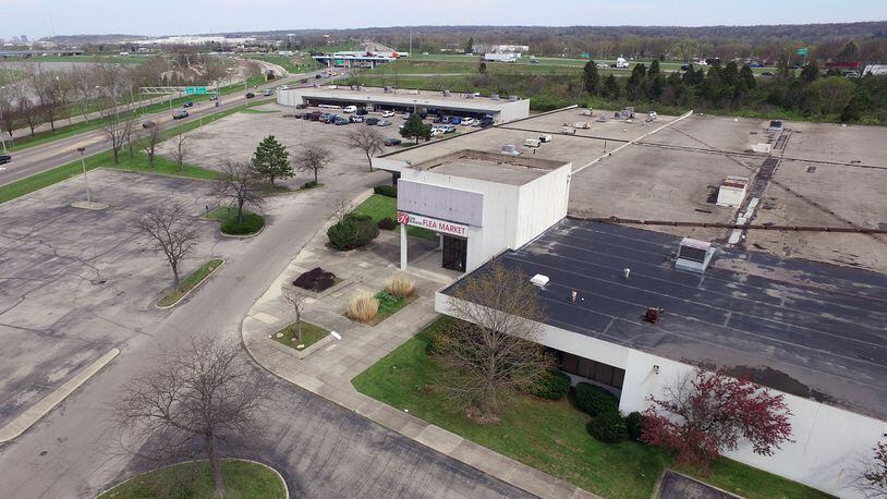 The former Carrollton Plaza site is seen as a key to the city’s plans for the Miami Bend Entertainment District, which is located adjacent to the Great Miami River with immediate access to Interstate 75. TY GREENLEES / STAFF