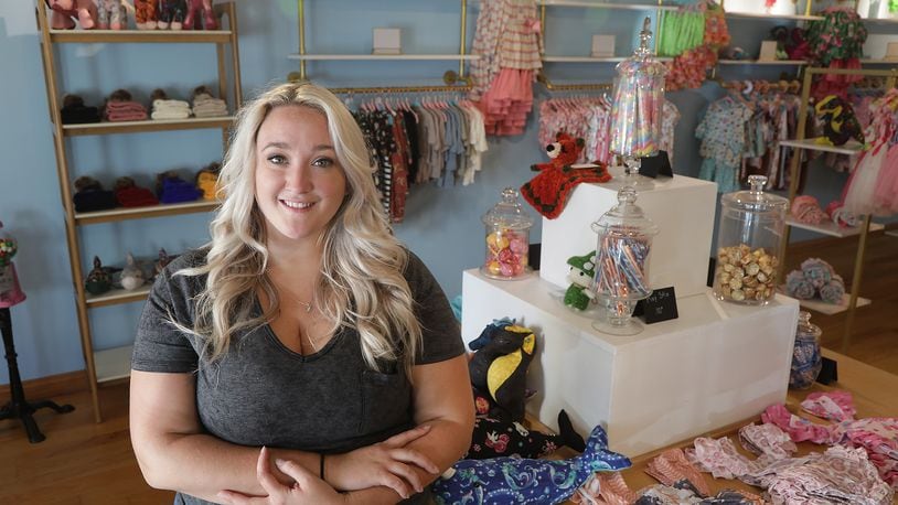 Tiffany Ballew, in her new boutique called HullaBallew in New Carlisle, Monday, Sept. 12, 2022. HullaBallew has its grand opening Saturday. BILL LACKEY/STAFF
