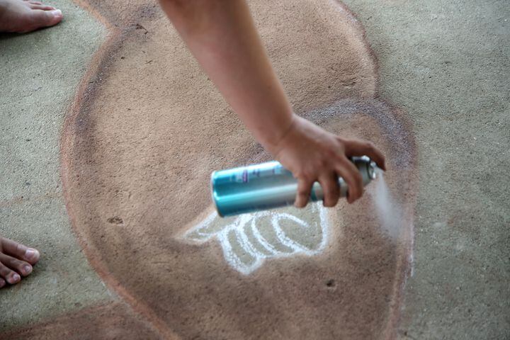 PHOTOS: Chalk artist creates latest artwork in undisclosed location
