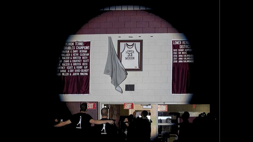 Kobe Bryant's Lower Merion jersey is unveiled in the Bryant Gymnasium during a ceremony at Lower Merion High School, Saturday, Feb. 1, 2020, in Ardmore, Pa.