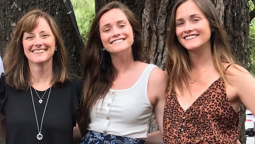 Traci Hale (Left) is shown with her twin adult daughters, Haley (center) and Kinsey Brown. All three are involved in a nationwide movement to make homemade lasagna meals and deliver them to families in need (Lasagna Love)