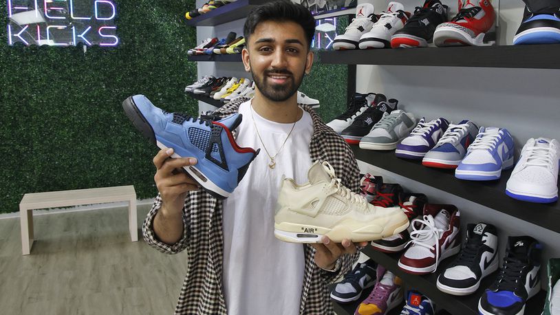 Paavan Patel in his new Springfield business, Field Kicks, a buy, sell and trade sneaker store located on North Plum Street Tuesday, April 9, 2024. BILL LACKEY/STAFF