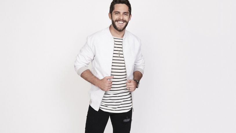Country singer Thomas Rhett, currently on tour with special guests Kelsea Ballerini, Russell Dickerson and Ryan Hurd, performs at the Nutter Center in Fairborn on Saturday, March 11. CONTRIBUTED BY CAMERON POWELL
