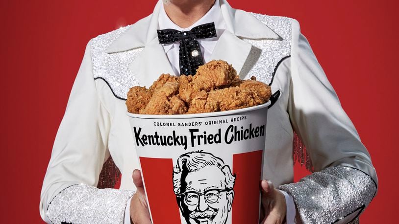 This photo provided by KFC shows singer Reba McEntire as KFC's Colonel Sanders. A rotating cast of famous names have portrayed the Colonel since 2015, but McEntire is the first female celebrity to do it, and the first musician. (Courtesy of KFC via AP)