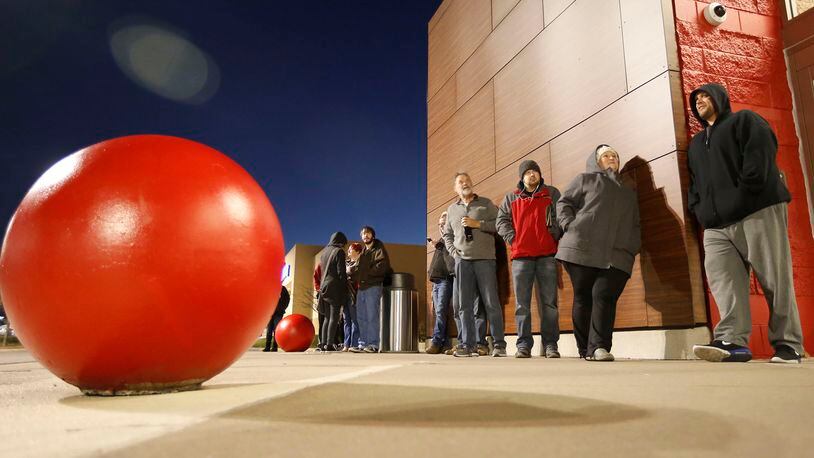 A short line formed at Target in Centerville for a 7 a.m. Black Friday opening. TY GREENLEES / STAFF