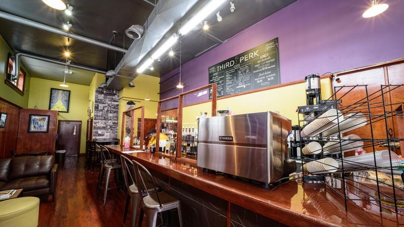 Step inside the new Third Perk Coffeehouse & Wine Bar, located at 146 E. Third St. in downtown Dayton’s Fire Blocks District. This location opened on December 30, 2020. Third Perk’s original location opened in 2016 at 46 W. Fifth St. Owner Juanita Darden decided to close the coffee shop February 20, 2020 for carpal-tunnel surgery but also had the desire to start fresh with a change of scenery. In addition to the downtown coffee shop, Darden operates Third Perk Express at the Dayton Mall. TOM GILLIAM / CONTRIBUTING PHOTOGRAPHER