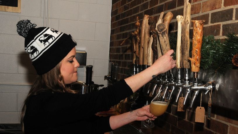Branch & Bone Artisan Ales celebrated 'The 12 Sour Beers of Christmas in Dayton' on  Dec. 12, 2019. Visitors to the craft brewery were able to try specialty sour beers as well as fan favorites. File photo by DAVID MOODIE / CONTRIBUTING PHOTOGRAPHER