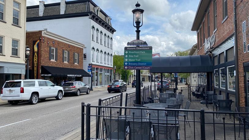 An outdoor drinking area is slated to go into effect in Miamisburg but with fewer days and hours than originally proposed.
Hours for the new Designated Outdoor Refreshment Area, or DORA, will be 4 to 9 p.m. Thursdays, 4 to 11 p.m. Fridays, noon to 11 p.m. Saturdays and 4 to 9 p.m. Sundays once they go into effect in June. ERIC SCHWARTZBERG/STAFF