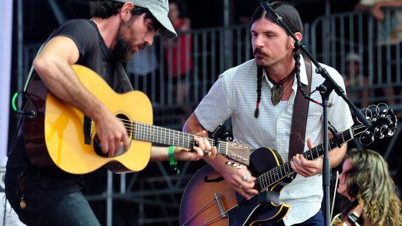 Seth and Scott Avett of the Avett Brothers get hot playing the final day of the Bonnaroo Music & Arts Festival on June 15, in Manchester, Tenn.