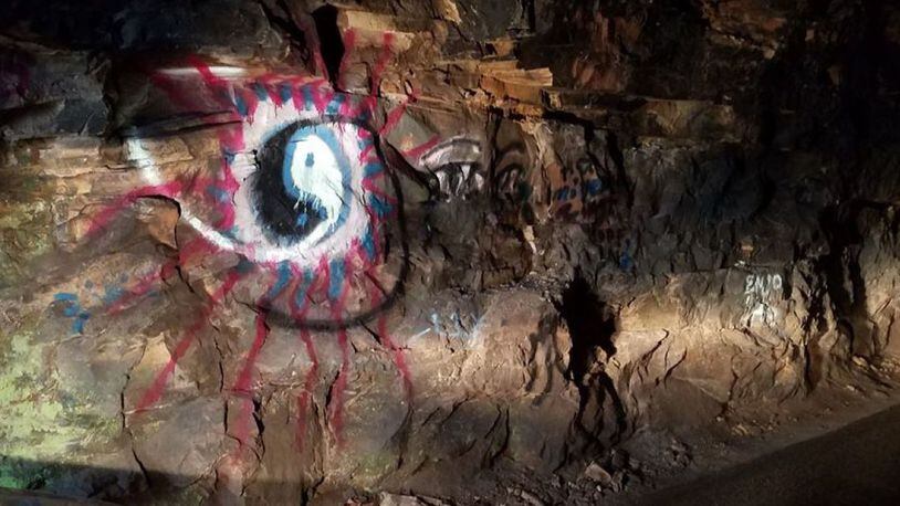 Vandals spray-painted a historic tunnel in the Daniel Boone National Forest.