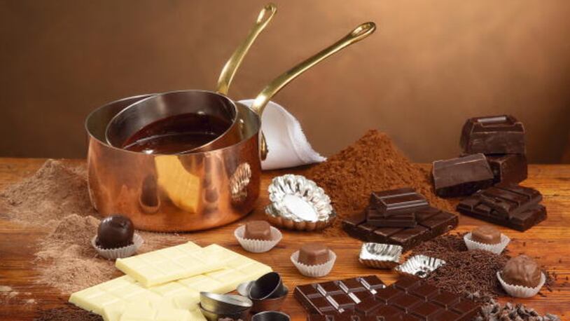 UNSPECIFIED - JUNE 06:  Assorted chocolates with cocoa powder and saucepans  (Photo by DEA / PRIMA PRESS/De Agostini/Getty Images)
