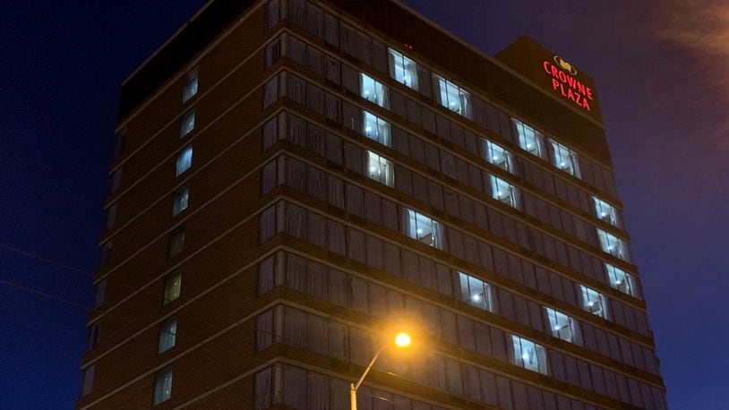 A beacon of love - a message during the coronavirus pandemic -  is beaming from the Crowne Plaza Hotel in downtown Dayton. LISA POWELL / STAFF