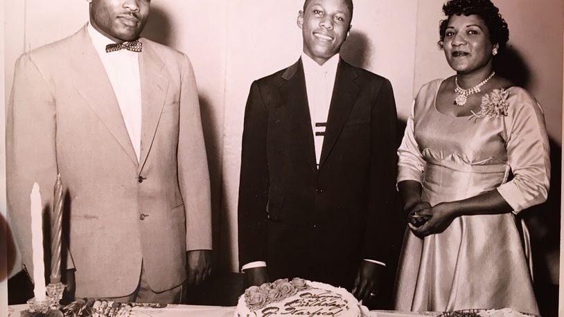 W.S. McIntosh at a birthday celebration with his son, J.W. McIntosh and wife,  Charline McIntosh.