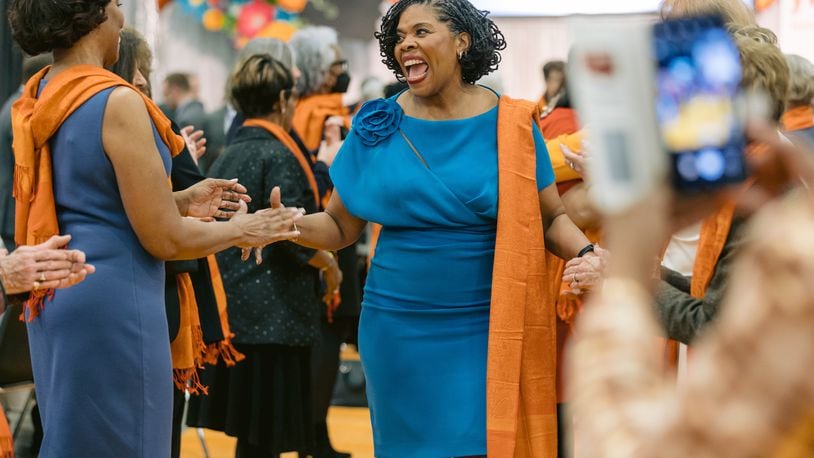 YWCA Dayton is asking local artists to draw inspiration from the persimmon colored pashminas that past and present honorees wear at the event (CONTRIBUTED PHOTO).