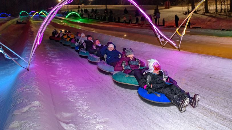 Guests participating in the glow tubing activity at Snow Trails in Mansfield.