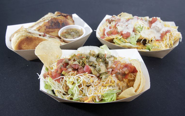 PHOTOS: El Meson delivers their signature dishes – and margaritas– on wheels