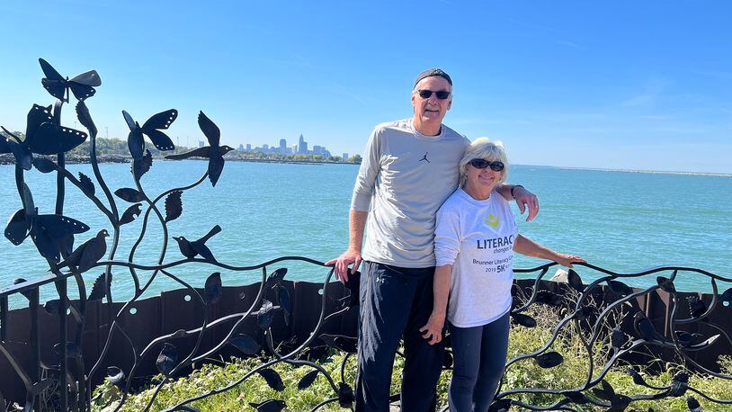 Steve and Barb Hess at a lakeside Metropark in Cleveland. This visit marked their 67th visit to a park since they began their tour in 2018. CONTRIBUTED
