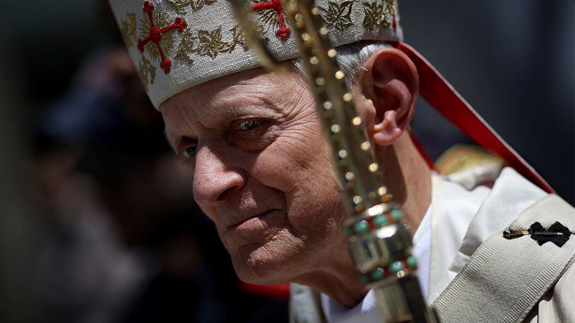 Cardinal Donald Wuerl, the Archbishop of Washington, waits outside St. Patrick's Catholic Church. Pope Francis as accepted the cardinal's resignation.