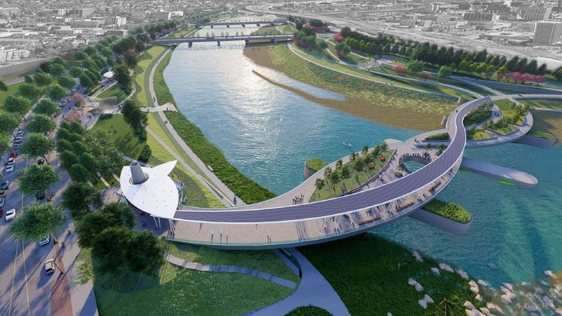 A futuristic-looking pedestrian bridge was proposed this year for the Great Miami River, connecting the existing Sunrise MetroPark and the proposed Sunset park. The “unity bridge” could cost $20 million to $40 million to construct and was described in the Riverfront Master Plan as a “park-over-the-river” featuring green spaces, trees, lawns, benches and other amenities. CONTRIBUTED