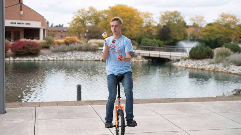 Thaddeus Krueger became the first person in the world to solve a Rubik’s Cube while juggling and riding a unicycle in 2019.