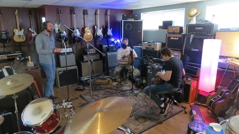 Slavalachia members (left to right) Benya Stewart, Brett Hill and Siarzhuk Douhushau, recording a new compilation album at Reel Love Recording Company, will perform at a Benefit for Ukraine at Sueño in Dayton on Sunday, April 24.