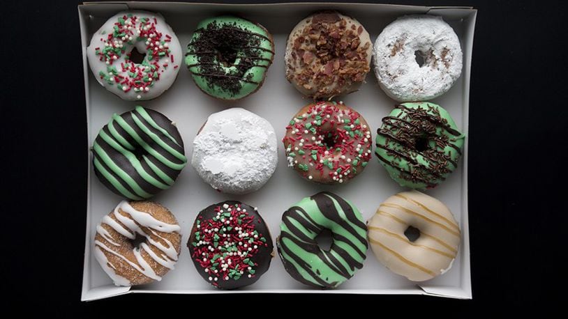 Duck Donuts is offering holiday season-themed doughnuts through Dec. 31. CONTRIBUTED