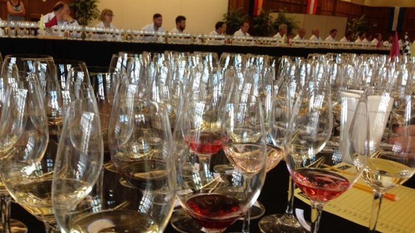 No, our local wine-tastings don’t look remotely like this, but you get the idea … MARK FISHER/STAFF