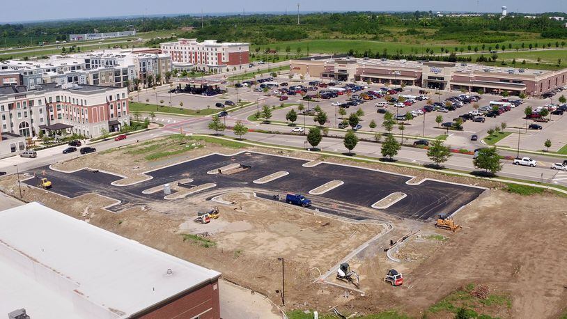 Site preparation is underway for the construction of a new Buffalo Wild Wings at Austin Landing along Springboro Pike. TY GREENLEES / STAFF