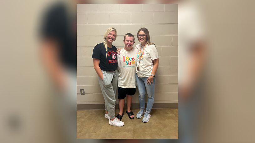 Olivia Taylor, left, is president and Andy Turner, center, is director of Best Buddies at Miamisburg High School. They are shown with their teacher and advisor, Amanda DiGiovanna, who helped Taylor create the program at Miamisburg High School three years ago. CONTRIBUTED