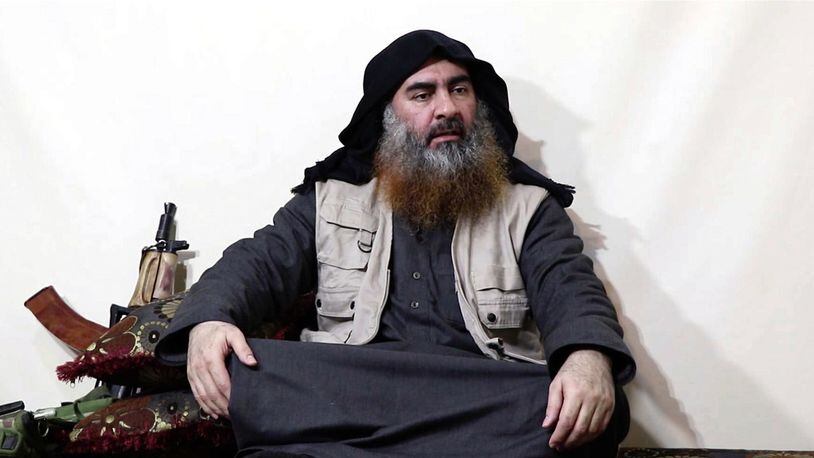 FILE - This file image made from video posted on a militant website April 29, 2019, purports to show the leader of the Islamic State group, Abu Bakr al-Baghdadi, being interviewed by his group's Al-Furqan media outlet.