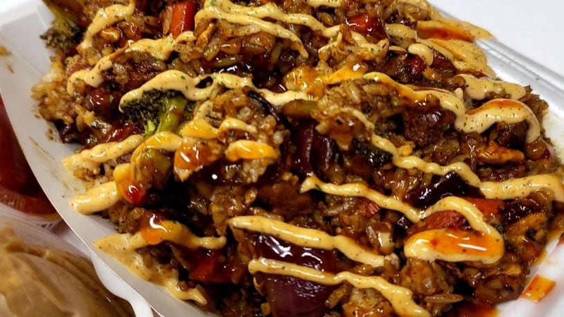 The Munchin’ Buddha, located at 100 N. James H. McGee Blvd., offers buddha (hibachi) bowls, street tacos, burgers, loaded fries and more. CONTRIBUTED