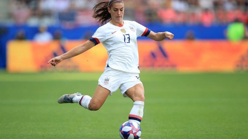 REIMS, FRANCE -  Alex Morgan of USA advances the ball at the  2019 FIFA Women's World Cup France Round Of 16 match.