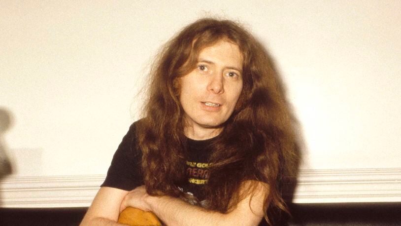 Photo of MOTORHEAD; Portrait of Fast Eddie Clarke backstage with guitars, circa 1980.  Clarke died at age 67 in London.